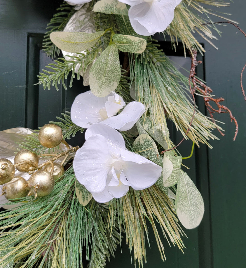 Long Needle Pine with Glittered White Orchids Wreath 22"